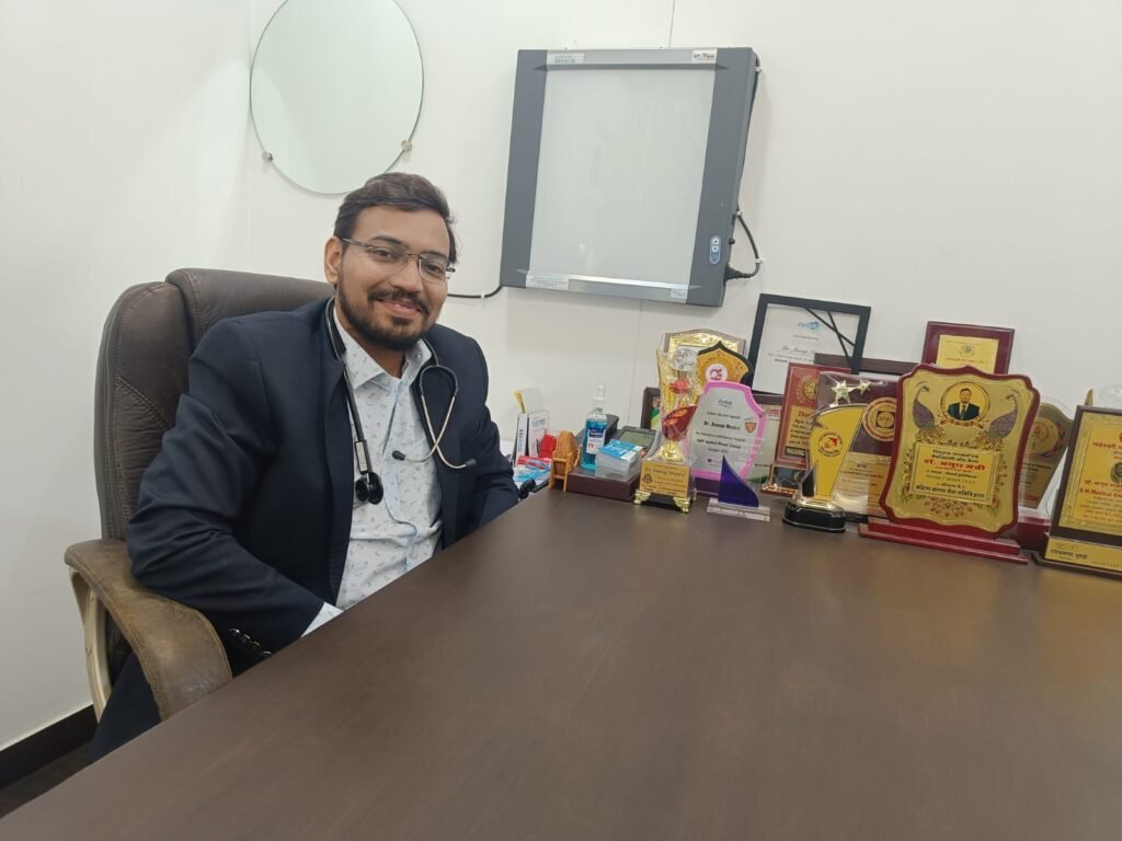 dr. anoop with awards